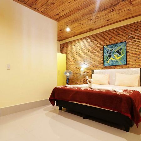 Tuk Tuk Timbul Bungalows Værelse billede