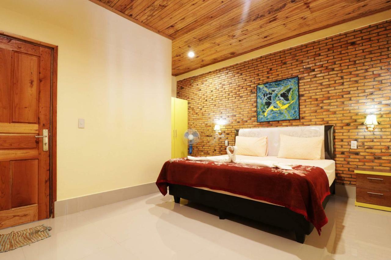 Tuk Tuk Timbul Bungalows Værelse billede